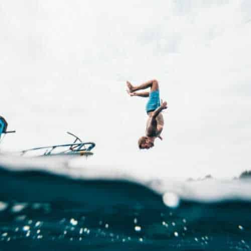 guy does backflip into ocean