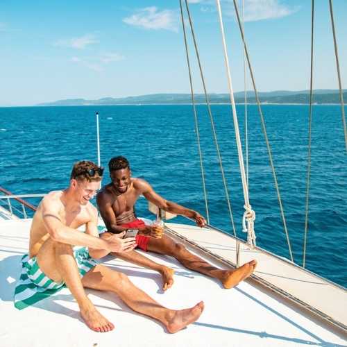 friends relax on boat deck