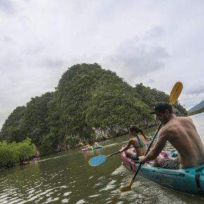 Couple kayaking in Thailand