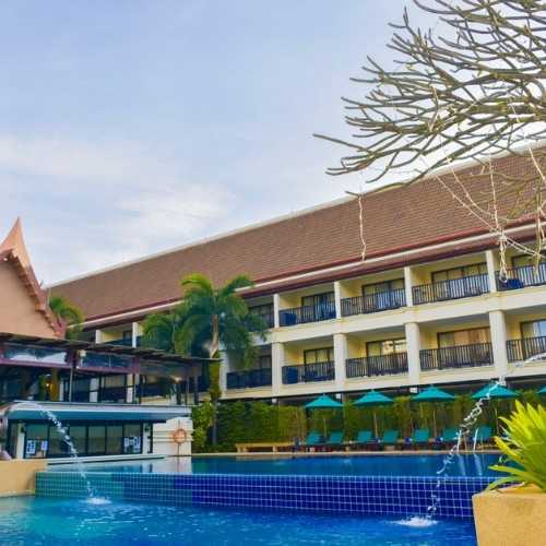 Deevana Patong Resort pool and umbrellas