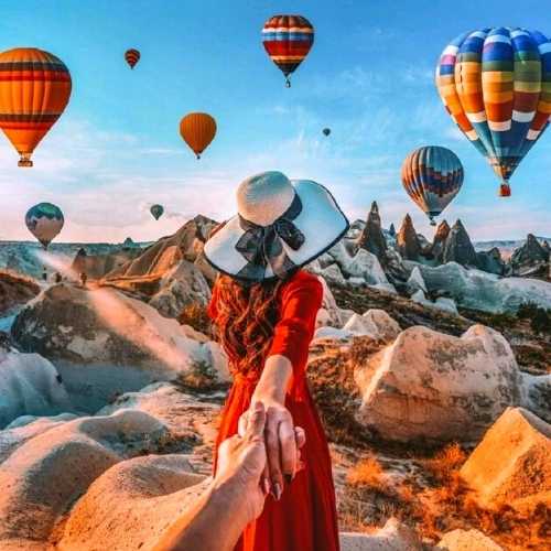 Cappadocia Baloons and woman