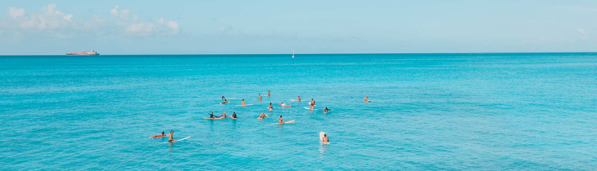 Surfers in the Water Bali