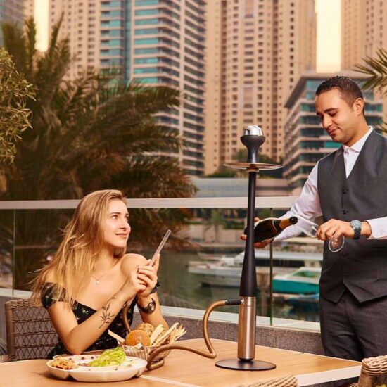 Woman eating lunch at the Crowne Plaza Marina