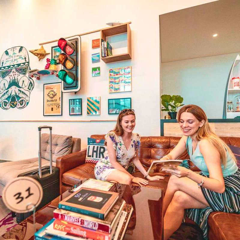 Rove Marina Dubai two girls on the couch