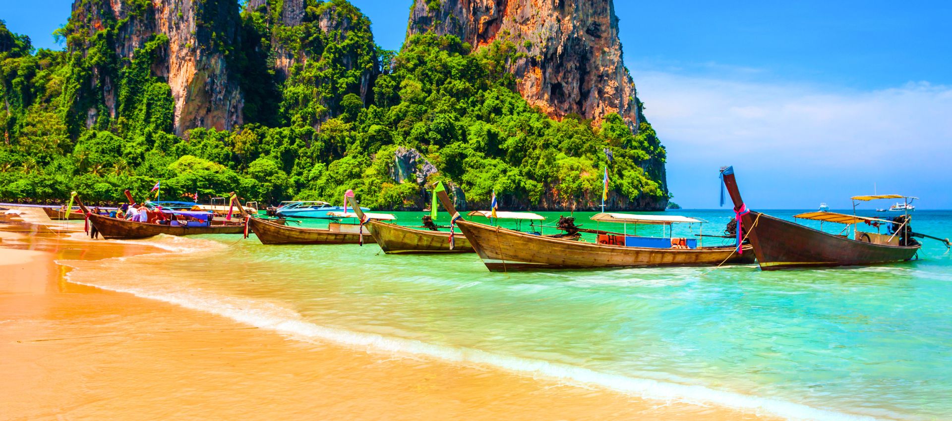 Krabi boats on beach Thailand