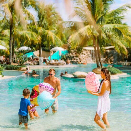 Family in the pool at Bali Mandira