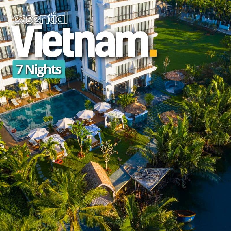 Essential Vietnam The shinning Hotel pool and trees Vietnam