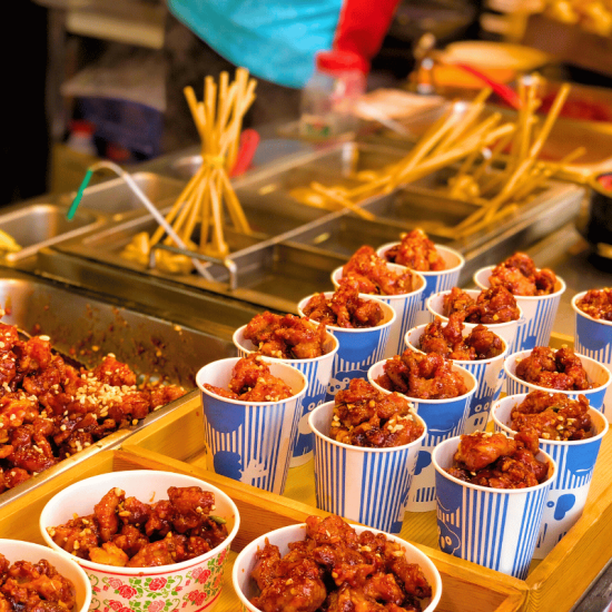 Colorful street food in cups